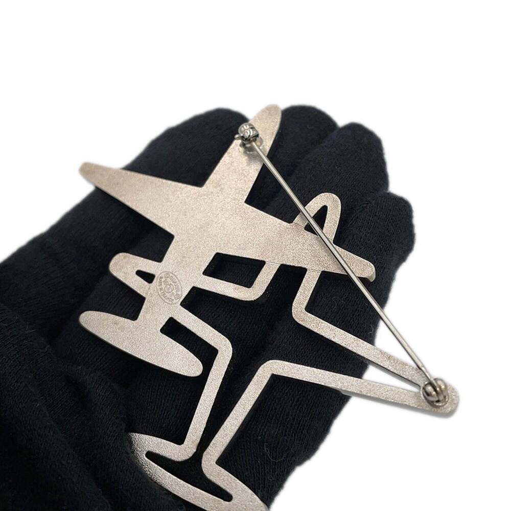 CHANEL Silver Logo Brooch - Picture 5 of 9